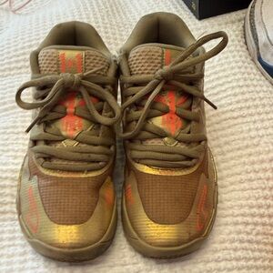 Hard to find gold "melos" by puma Low-Top Sneakers